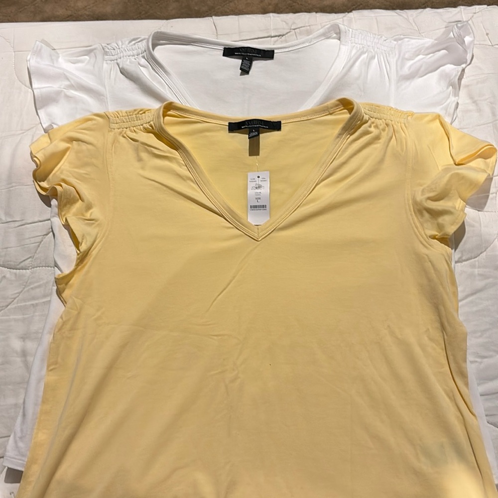 White House Black Market two flutter sleeve shirts. 1 yellow NWT, 1 white NWOT
